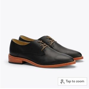 Nisolo Black Leather Flats with Brown Sole